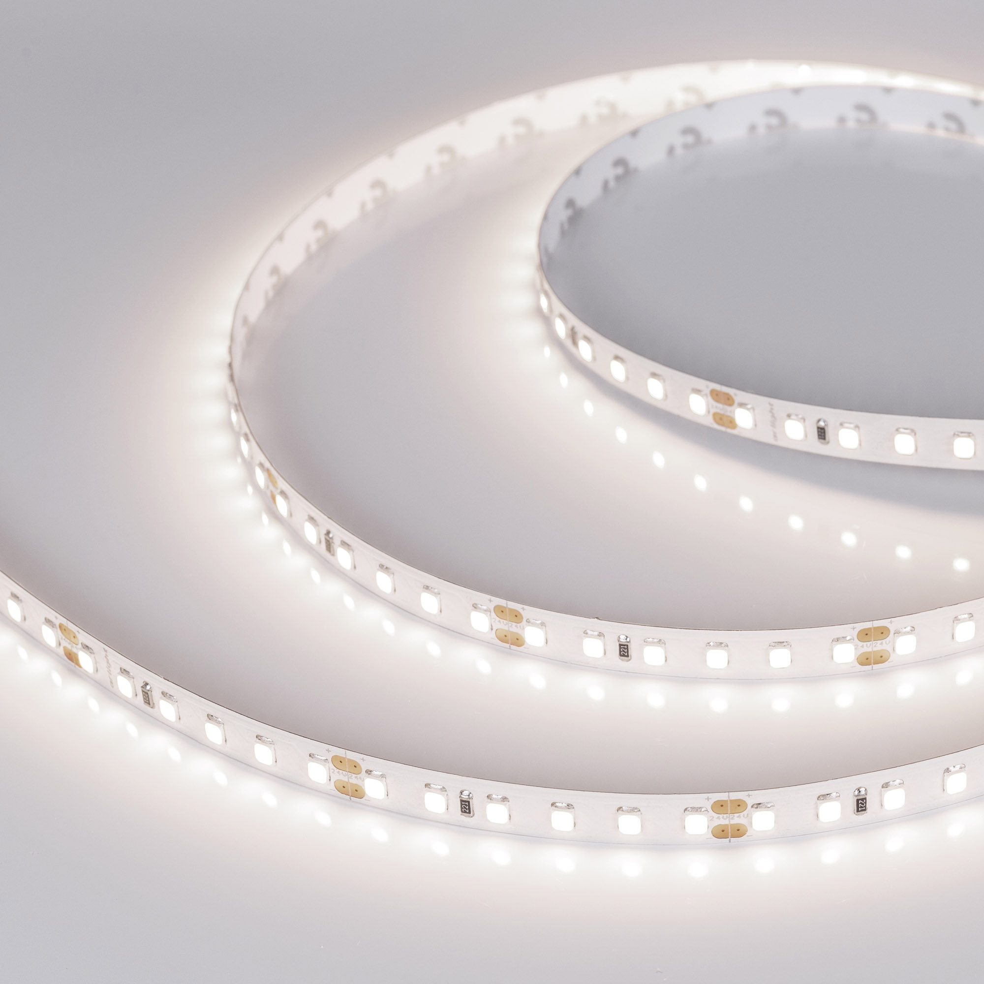 Светодиодная лента Arlight 14,4W/m 120LED/m 2835 Day4000 8mm 24V 5M 5M IP20 015698(2)