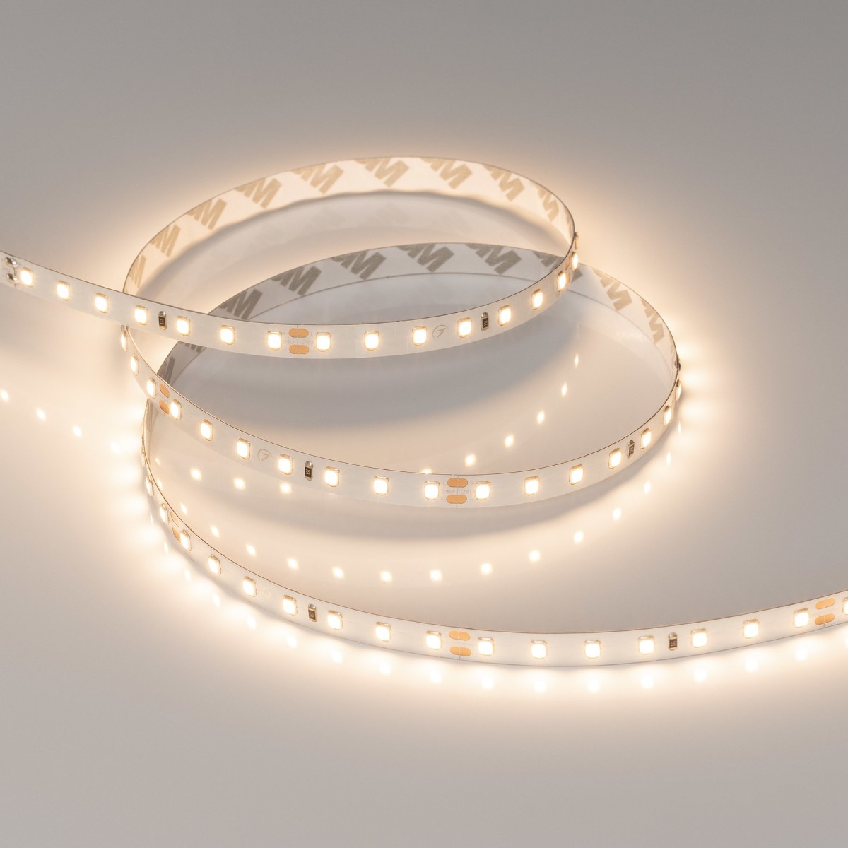 Светодиодная лента Arlight 10W/m 98LED/m 2835 Warm3000 8mm 24V 5M IP20 040007