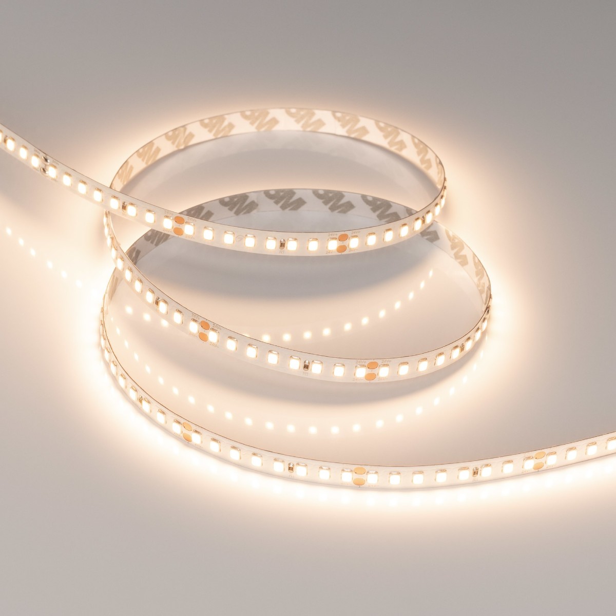 Светодиодная лента Arlight 12W/m 160LED/m 2835 Warm3000 8mm 24V 5M IP20 040011